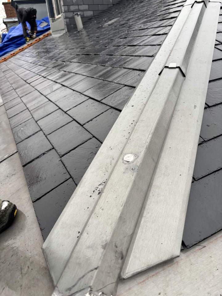 Travaux de zinguerie sur mesure pour évacuation des eaux.